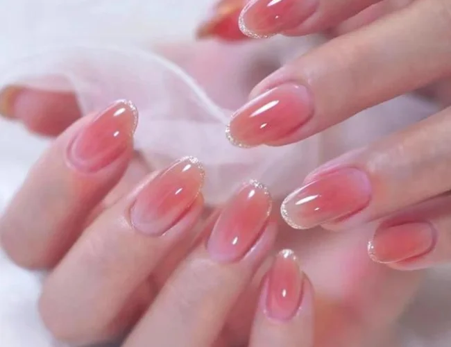 Stylish nail art with pink almond tips